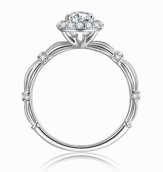 a white gold engagement ring with diamonds on it