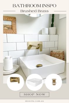 a bathroom with white tile and gold fixtures on the wall, including a square sink