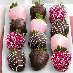 chocolate covered strawberries are arranged on a plate