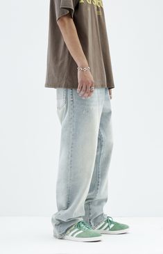 Experience laid-back comfort with PacSun's Light Tinted Indigo Baggy Jeans. These jeans feature a lived-in feel with a zip fly closure and a tinted indigo wash. Crafted from rigid cotton, they offer a wide leg and a five-pocket body, combining durability with casual style for everyday wear.


	Model is wearing size 32
	Model Measurements: 6'0” Height, 28” Waist, 32” Inseam Casual Straight Leg Bottoms With Zip Fly, Casual Straight Leg Jeans, Casual Cropped Jeans, Casual Relaxed Fit Jeans, Baggy Cotton Jeans With Zip Fly, Casual Light Wash Jeans For Streetwear, Casual Baggy Washed Blue Jeans, Casual Washed Blue Flare Jeans, Urban Jeans With Relaxed Fit And Zip Fly