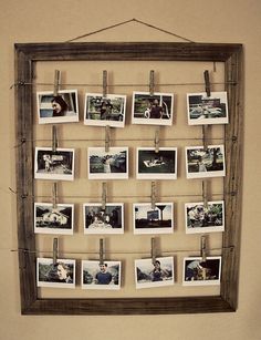 an old wooden frame with photos hanging on it