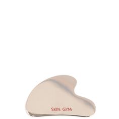 Enhance your skincare routine with this facial massaging tool which is a modern take on an ancient beauty ritual. Designed with 100% stainless steel, this Gua Sha tool will give your skin an instant glow. | Skin Gym Stainless Steel Gua Sha | Dermstore Gua Sha Tools, Skin Care System, Ancient Beauty, Massage Tools, Gua Sha, Beauty Tools, Skincare Routine, One Color, Beauty Skin