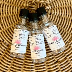 three medicine bottles sitting on top of a wicker basket