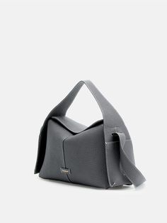 Drippy Roof Bag Luxury Rectangular Hobo Bag For Office, Luxury Structured Hobo Bag, Modern Flap Bag With Removable Pouch And Double Handle, Luxury Square Hobo Bag For Travel, Modern Square Leather Bucket Bag, Modern Top Handle Flap Bag With Removable Pouch, Modern Top Handle Satchel In Soft Leather, Modern Soft Leather Top Handle Satchel, Modern Tote Flap Bag With Top Carry Handle