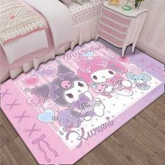 a pink rug with cartoon characters on it in a girls's bedroom, next to a bed and dresser