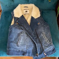 Daughters Of The Liberation - Anthropologie - Sherpa Lined Denim Vest. Zip Front With Pockets On Both Sides. Size Small - New Never Worn - Trendy Dark Wash Denim Vest For Winter, Winter Denim Vest In Medium Wash, Fitted Denim Vest For Winter, Button-up Denim Vest With Pockets For Fall, Anthropologie Sherpa, Sherpa Lined Denim Vest, Cotton Button-up Denim Vest With Pockets, Denim Blue V-neck Denim Vest, Fitted Denim Vest With Button-up Closure