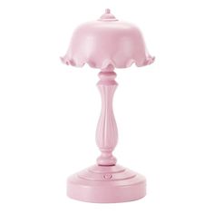 a pink table lamp on a white background