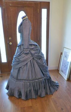 You are looking at a handmade 100% silk dupioni dress gown creation that I will custom construct just for you by your own measurements. The dress is shown here in cadet blue. This silk Victorian dress can be built in most any color on the colors wheel. Silk is made in hundreds of colors. Let me know the color you wish to have. I love constructing Victorian bustle dresses from silk. The silk bustle poufs fluff up so beautifully. Silk slubs( nubby lines) add dimension that makes the fabric look ve Victorian Ball Dress, Silk Dupioni Dress, Wedding Dress Victorian, Victorian Dress Costume, Dupioni Silk Dress, Dress Bustle, Victorian Bustle, Victorian Wedding Dress, Walking Dress