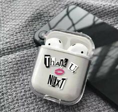 an airpods case with the words thank you next to it and a pink lip