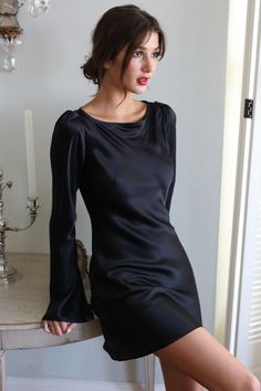 Slip on mini dress with long sleeves. Flattering for all shapes and sizes. Made of a pink polka dot silk. Sleek Long Sleeve Satin Evening Dress, Glamorous Long Sleeve Satin Formal Dress, Glamorous Long Sleeve Satin Evening Dress, Elegant Mini Silk Dress For Date Night, Elegant Sheath Mini Dress For Night Out, Elegant Mini Satin Dress For Night Out, Chic Mini-length Satin Dress For Formal Occasions, Chic Formal Mini Length Satin Dress, Dressy Sheath Mini Dress For Dinner