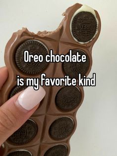 someone holding an oreo chocolate bar with the words oreo chocolate is my favorite kind