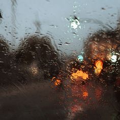 rain drops on the windshield of a car