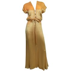 Hollys Harp 1970's Gold Silk Evening Gown Size label: S Measurements taken flat: Shoulders: 24.5" Armpit to armpit: 17.5" Bust: 17.5" Waist: 13" Hips: 20" Length - Front: 45.5" Back: 58" Good Vintage Condition:Please remember all clothes are previously owned and gently worn unless otherwise noted. ALL SALES FINAL. No refunds or exchanges. Gold Ball Gown, High Neck Halter Dress, Uzun Boy, Chic Closet, 1970s Clothing, Vintage Ball Gowns, Silk Evening Gown, Gold Evening Dresses, Velvet Dress Long