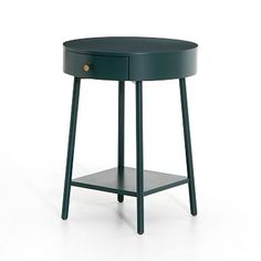 the side table is made from dark green wood