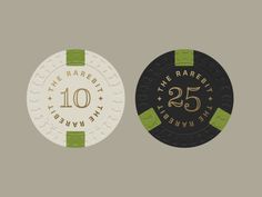 two poker chips with the numbers twenty five and twenty five on each chip, one in gold