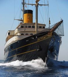 a large black and white boat in the ocean