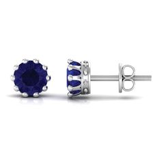 Product Details Add a pop of color to your jewelry collection with these stunning round blue sapphire solitaire stud earrings. The high-quality sapphires are set in a secure crown setting, crafted from durable and lustrous gold. The simple yet elegant design makes these earrings perfect for both casual and formal occasions, while the vibrant blue hue adds a touch of sophistication to any outfit. These sapphire stud earrings are a classic and timeless addition to any jewelry collection and make a Sapphire Stud Earrings, Sapphire Earrings Studs, Sapphire Studs, Sapphire Solitaire, Solitaire Studs, Vibrant Blue, Blue Hues, Blue Sapphire, Elegant Design