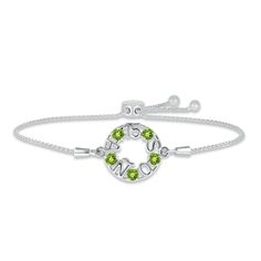 Make her Quinceañera dreams come true with this lovely bolo bracelet, perfect for celebrating an August birthday. The phrase "15 Años" is crafted in sterling silver with colorful round peridots gleaming between the letters. The wheat chain measures up to 9.5 inches and secures with an adjustable bolo clasp. Adjustable Green Jewelry For Mother's Day, Sterling Silver Bracelets For May Birthstone Anniversary, Adjustable White Gold Jewelry For Mother's Day, Adjustable White Gold Jewelry For May Birthstone, Sterling Silver Name Bracelet For Friendship, Sterling Silver Jubilee Bracelet Jewelry For Birthday, Adjustable White Gold Bracelet For Birthday, Adjustable Bracelets For Anniversary, Sterling Silver Name Bracelet For Birthday