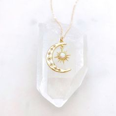 DESCRIPTION: The AURORA Sun + Moon Necklace - Gold crescent moon + opal sun pendant on a dainty gold filled chain. We love this celestial necklace and think you will too! MATERIALS:Chain, clasp, and jump rings - Gold filledPendant - Gold plated, OpalPENDANT SIZE:Approximately 1” in length PACKAGING:Your necklace will arrive on a Dainty Doe signature jewelry card placed in a white jewelry box, with a bow and tag, perfect for gift giving!GIVING A GIFT:We would love to include a hand written note f Necklace Sun And Moon, Sun Moon Necklace, Necklace Sun, Sun And Moon Necklace, Moon Necklace Silver, Star And Moon Necklace, Gold Moon Necklace, Necklace Opal, White Jewelry Box