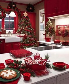 a kitchen decorated for christmas with red and green decor