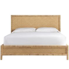 a bed with white sheets and pillows on top of it's headboard, in front of a white background