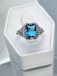 London Blue Topaz Ring, Lovely Rectangle, Victorian Jewelry, Edwardian style, Silver Embrace Jewelry, D148 Blue Topaz Jewelry With Accent Stones, Blue Topaz Fine Jewelry, Art Deco Blue Topaz Ring With Emerald Cut, Radiant Cut Blue Topaz Jewelry For Formal Occasions, Elegant Blue Rectangular Ring With Accent Stones, Elegant Blue Rectangular Rings With Accent Stones, Blue Square Cut Ring As A Gift, Formal Blue Emerald Cut Jewelry, Blue Rectangular Rings With Accent Stones