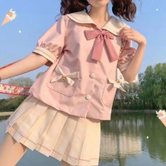 Get ready to hop into style with the Pink Bunny Sailor Uniform Outfit. This kawaii outfit is perfect for those who want to add a fun and playful touch to their wardrobe. Whether you're a fan of cute and quirky fashion or just looking to stand out, this outfit is sure to make a statement. Material: Polyester Size Chart: Harajuku Style Cotton Top For School, Collared Summer Tops For School, Fitted Tops With Sailor Collar For Spring, Kawaii Spring Tops For School, Kawaii Tops For School In Spring, Spring Kawaii Tops For School, Cute Pink Tops For School, Kawaii Cotton Tops For Cosplay, Cotton Kawaii Tops For Cosplay