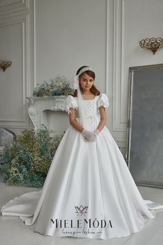 Designed and proudly made in Europe. Ships from the USA. PLEASE NOTE: Any accessories pictured (i.e. mask, headpiece, gloves, capes, veils, etc.) are available for purchase upon request and not included in this listing unless otherwise stated. Girls Communion Dresses, Holy Communion Dresses, Princess Silhouette, 파티 드레스, First Communion Dress, First Communion Dresses, Custom Gown, Gowns For Girls, Communion Dresses