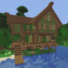 a large wooden house sitting on top of a river next to a lush green forest