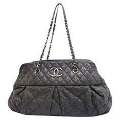 Chanel Chic Quilted Bowler Bag, Features CC Logo, zip Closure, Chain Strap and Three Interior Pocket. Material: Leather Hardware: Silver Height: 26cm Width: 39cm Depth: 16cm Shoulder Drop: 26cm Overall condition: Fair Interior condition: Signs of use External condition: Scuffing and hardware tarnish Chic Quilts, Bowler Bag, Shoulder Bag Black, Cc Logo, Bag Shoulder, Bago, Fashion Handbags, Chain Strap, Chanel Bag