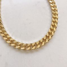 "Elevate the every day with this beautiful Statement thick gold chain necklace . Classic and super trendy for layering and for everyday wear. Materials: 14k gold plating over brass. Nickel free. Measurements: Chain length: 40cm (15\") +8cm(3\") extender chain. Chain thickness: 8 mm Shipping: Please allow 1-3 business days for your order to be processed and shipped. Gift: All orders are shipped in our customize box, gift ready. **Let me know if you have any questions at all and I will promptly re Gold Cuban Link Double Chain Necklace, Trendy Gold Plated Chain Link Necklace, Trendy Gold-plated Chunky Chain Necklace, Trendy Gold Curb Chain Necklace, Trendy Gold Plated Chunky Chain Necklace, Trendy Cuban Link Gold Chain Necklace, Trendy Gold Chain Necklace With Chunky Chain, Trendy Gold Cuban Link Necklace, Trendy Gold Chain Necklace With Cuban Link