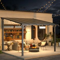 an outdoor living area is lit up at night