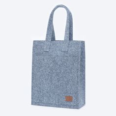 timeless design with a clear Scandinavian heritage makes the shoulder bag perfect for the ones with the fast pace of life. tote bag is offering plenty of space for all the things one might need while remains versatile to work with any outfit. it's durable felt and handmade production make this tote bag your everyday companion for a long time. soft texture, yet the stiff form of industrial felt make Nordhale products durable and help keep its shape. all our products are hand-made in Estonia. we v Gray Top Handle Bags For Travel, Gray Top Handle Bags For Daily Use, Gray Top Handle Travel Bag, Gray Large Capacity Bags For Shopping, Gray Satchel Bag For Shopping, Gray Tote Bag For Shopping, Gray Rectangular Bag For Daily Use, Gray Top Handle Bag For Shopping, Gray Top Handle Shopping Bag