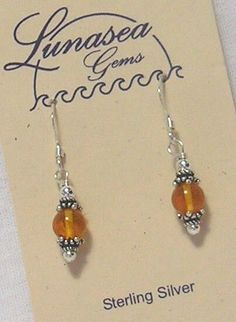 BY LUNASEA TREASURES of NEW ENGLAND,  AMBER & STERLING SILVER BEADED DANGLE EARRINGS.   GENUINE GOLDEN YELLOW AMBER 6mm ROUND BEAD IS SANDWICHED BETWEEN PRETTY STERLING SILVER CAPS & BALLS.  EARRINGS MEASURE 3/4" FROM FRENCH EAR WIRES.  SAFETY BACKS ARE INCLUDED.  ALL FINDINGS ARE STERLING SILVER.  BE SURE TO CHECK OUT MY OTHER JEWELRY I HAVE LISTED. Froo www.froo.com | Froo Cross Sell, Free Cross Sell, Cross promote, eBay Marketing, eBay listing Apps, eBay Apps, eBay Application Amber Dangle Earrings, Boho Earrings Diy, Diy Earrings Tutorial, Beaded Jewelry Earrings, Unique Handmade Earrings, Earrings Ideas, Dangle Earrings Boho, Diy Jewelry Unique, Amber Gemstone