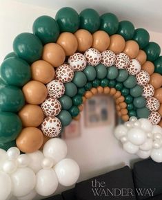 an arch made out of balloons and balls