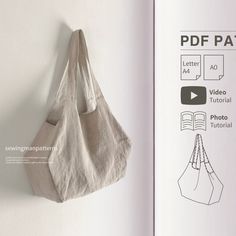 an open book with a bag hanging on the wall