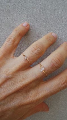 "Before placing an order please check the estimated shipping times. If you need your order in a hurry shipping upgrades are available. Thank you. This little chain ring is beautiful in its simplicity! D E T A I L S *It features a sparkly raw Herkimer diamond. * Herkimer diamonds are actually double terminated quartz crystals. The \"diamond\" in their name is due to both their clarity and natural faceting. *That has been wire wrapped using gold fill wire to a 14k gold filled chain that is surpris Minimalist Diamond Cut Jewelry For Promise, Minimalist Diamond Cut Promise Jewelry, Delicate Diamond Cut Ring Jewelry, Dainty Open Ring With Rose Cut Diamonds, Dainty Rose Cut Diamond Promise Jewelry, Dainty Rose Cut Diamond Open Ring, Dainty Crystal Toe Ring For Promise, Dainty Rose Gold Promise Crystal Ring, Dainty Rose Gold Promise Ring Jewelry