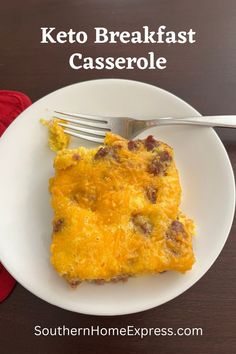 keto breakfast casserole on a white plate with a fork