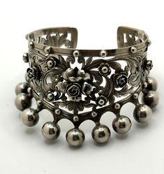 Extremely rare vintage signed Peruzzi 800 silver Florence cuff with rose and etruscan ball motif. Excellent condition. Elegant Ceremonial Sterling Silver Bracelet With Oxidized Finish, Ceremonial Oxidized Finish Cuff Bracelet, Elegant Ceremonial Cuff Bracelet With Oxidized Finish, Ceremonial Oxidized Finish Elegant Cuff Bracelet, Elegant Ceremonial Oxidized Cuff Bracelet, Vintage Hallmarked Antique Silver Cuff Bracelet, Elegant Oxidized Finish Cuff Bracelet For Formal Occasions, Vintage Stamped 925 Cuff Bracelet For Wedding, Elegant Antique Silver Cuff Bracelet