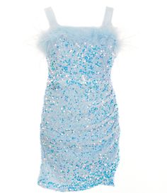 a dress with blue and white sequins on the front, as well as feathers