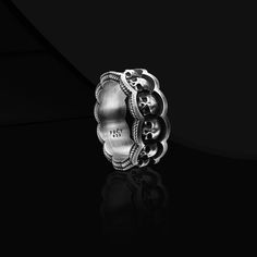 Silver Skull Wedding Ring  Introducing our exceptional Unique Skull Wedding Band Ring For Men in Sterling Silver, a true masterpiece of vintage goth elegance. This stunning piece boasts intricate skull details that beautifully blend the essence of gothic aesthetics with a touch of timeless elegance. Crafted in sturdy sterling silver, this unique biker mens promise ring is thoughtfully designed to make a bold statement. Whether it's for a wedding or simply a stylish accessory, this silver men's jewelry will effortlessly elevate any ensemble. Perfect for those who appreciate unconventional charm, this remarkable skull wedding band ring is a must-have for any fashion-forward gentleman. Item Details Male - Female Product Code: FRYKKA102 Product Name: Silver Skull Wedding Ring  Metal: Handmade Goth Engagement, Goth Engagement Rings, Mens Promise Ring, Skull Wedding Ring, Promise Rings For Guys, Skull Wedding, Engagement Ring Unique, Vintage Goth, 22 Carat Gold