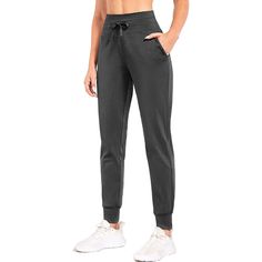 Stay warm and protected from the elements with our Women's Fleece Lined Pants. These water-resistant thermal joggers are perfect for winter running, hiking, and even just lounging around at home. The fleece lining will keep you cozy and comfortable, while the water-resistant material will keep you dry in light rain or snow. The pockets are perfect for storing your phone, keys, or other essentials while you're on the go. These sweatpants are perfect for any outdoor activity and are sure to become Winter Outdoor Joggers With Elastic Waistband, Outdoor Sportswear Sweatpants With Elastic Waistband, Sporty Winter Joggers For Outdoor Activities, Outdoor Sportswear Sweatpants With Pockets, Sportswear Sweatpants With Pockets For Outdoor, Sporty Winter Joggers For Outdoor, Sporty Winter Outdoor Joggers, Sporty Outdoor Winter Joggers, Midweight Joggers With Elastic Waistband For Outdoor