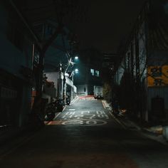 an empty street at night with no traffic