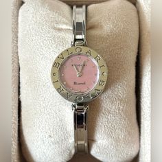 Bvlgari B.Zero1 S Size Bz22s Stainless Steel Ladies Watch Brand : Bvlgari Type : Wristwatch Gender : Women Material Case : Stainless Steel Material Band : Stainless Steel Color Dial :Pink Mother Of Pearl Shell Watch Movement : Quartz Case Width Mm : 22mm / 0.87'' Wrist Size Max Cm : 15.5 Wrist Size Min Max Cm : 15.5cm / 6.1'' Accessories : Inner Box, Manual, Outer Box. Warranty Accessories Notice : Before Purchasing, Please Refer To The Images Of The Accessories Included With The Item. Condition Bvlgari Bracelet Bangles, Bvgalri Watch, Bvlgari Wrap Watch, Bvlgari Serpenti Seduttori Watch, Bvlgari Serpenti Watch, Brand Watches Women, Bangle Watches, Ladies Watch, Pearl Shell