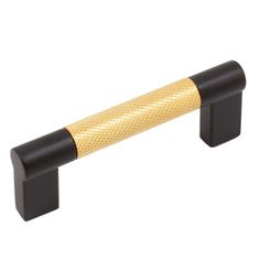 a black and gold door handle on a white background