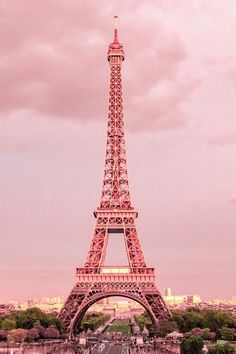 the eiffel tower is pink in color and it looks like something from paris