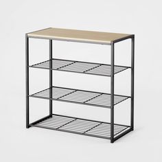 a metal and wood shelf with two shelves on each side, against a white background