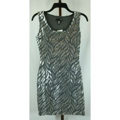 ...Womens Gray Size Xs Measurements: Length: 31" Chest: 30" Fiber Content: Shell - 95% Polyester/5% Spandex; Lining And Trim -100% Polyester. Dry Clean. Blue And Silver Dress, Tiered Ruffle Mini Dress, Aqua Dresses, Floral Ruffle Dress, Ruffle Midi Dress, Aqua Dress, Flare Mini Dress, Leopard Dress, Ruffle Mini Dress