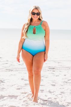 Be as pretty as a mermaid! This swimsuit is calling your name! This chic swimsuit has an ombre color you can wear with your favorite cover-ups and sandals! It's comfortable for all-day wear, has a figure-flattering one-piece design, and features the cutest keyhole halter top! Wear this swimsuit all season long! 82% Polyamide, 18% Elastane Mermaid Swimwear For Beach Season, Mermaid Swimwear For Beach, Beach Season Mermaid Swimwear, Mermaid Swimwear For Beach Party, Mermaid Style Swimwear For Beach Season, Mermaid Style Beachwear Swimwear, Mermaid Swimwear For Beachwear, Blue Mermaid Swimwear For Poolside, Blue Mermaid Swimwear For The Beach