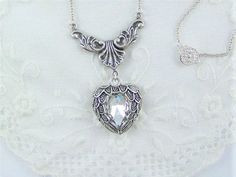 Crystal Heart Necklace, Winged Heart, Crystal Heart, Wedding Necklace, Angel Wings, Heart and Wings, Elegant Crystal Heart Necklace For Wedding, Silver Crystal Heart Necklace For Wedding, Silver Heart Necklace For Wedding On Valentine's Day, Silver Heart Necklace For Valentine's Day Wedding, Silver Heart Necklace For Wedding, Elegant Crystal Necklace With Heart Charm, Silver Vintage Heart Necklace For Wedding, Vintage Silver Heart Necklace For Wedding, Elegant Silver Heart Crystal Necklace